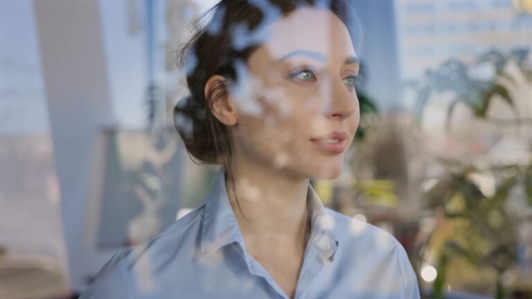 A business owner looking through the glass